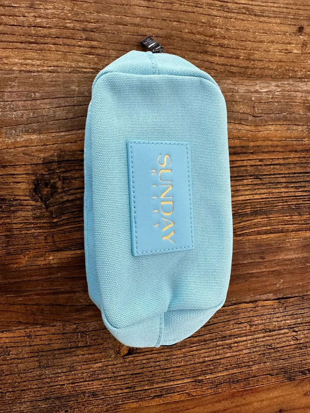 Sunday Riley Pastel Blue Canvas Cosmetic Pouch with Gold Logo